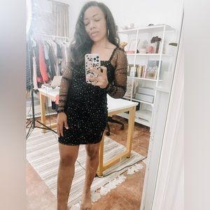 Iridescent gems + sheer tulle = STATEMENT dress!